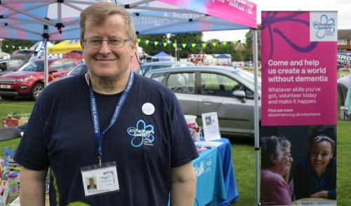 Image of Andrew standing in an Alzheimer's Society tshirt