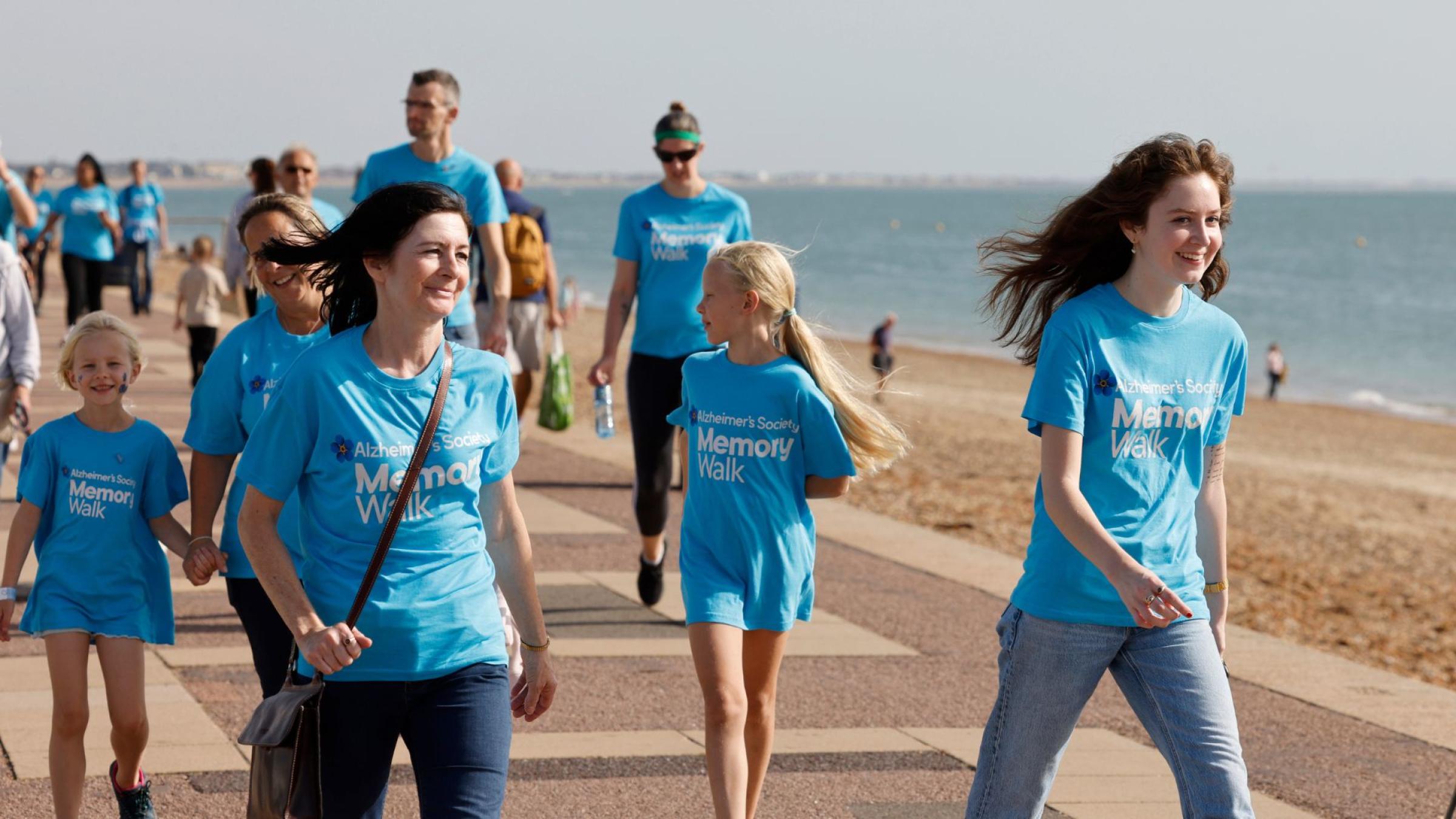 Image of supporters taking part in Memory Walk on the beach