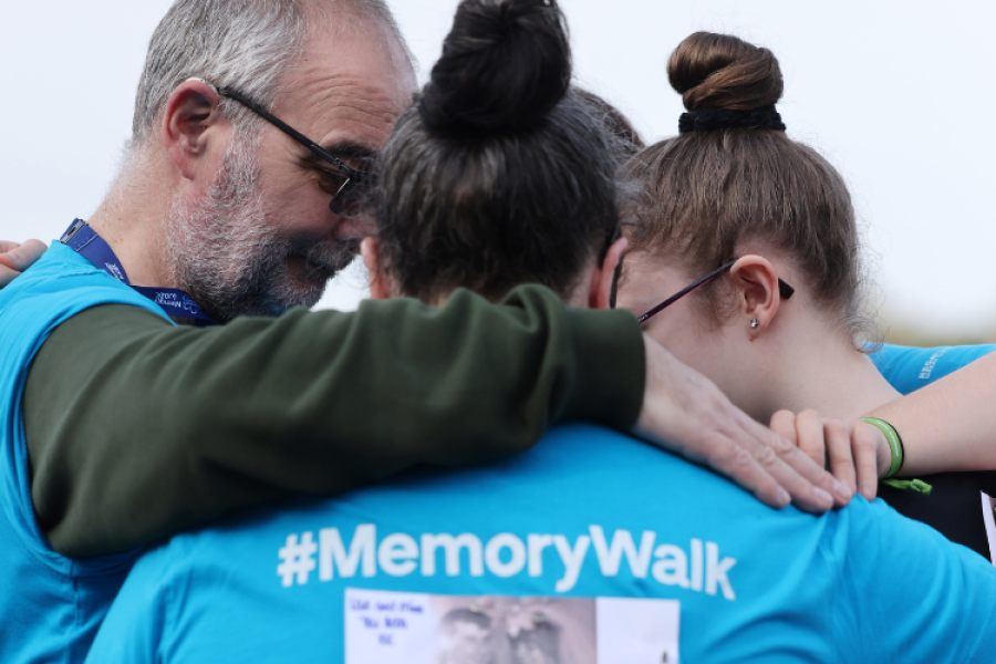 Memory Walkers embracing at Heaton Park