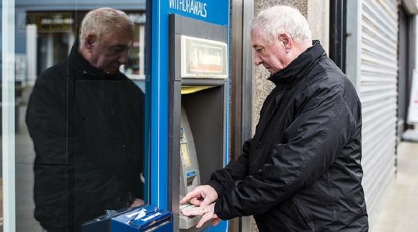 Man at a cash machine