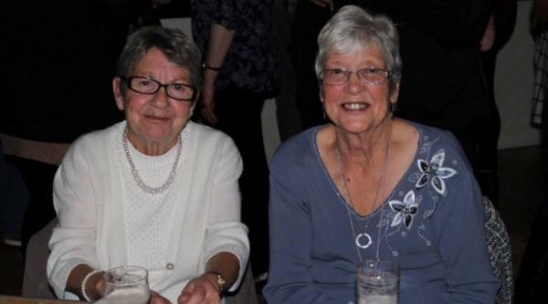 Georgia's two grandmas, Bet and Janet, smiling beside each other