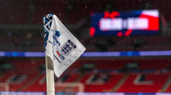 A flag with FA and Alzheimer's Society logos on