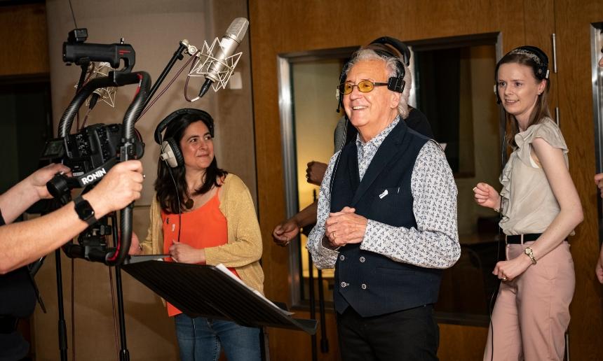 Tony Christie with two carers during the Thank You Day recording