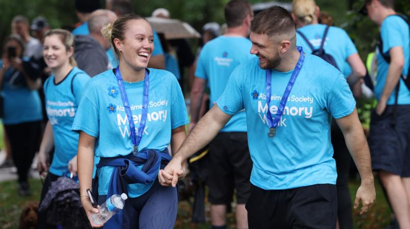 Two walkers smiling