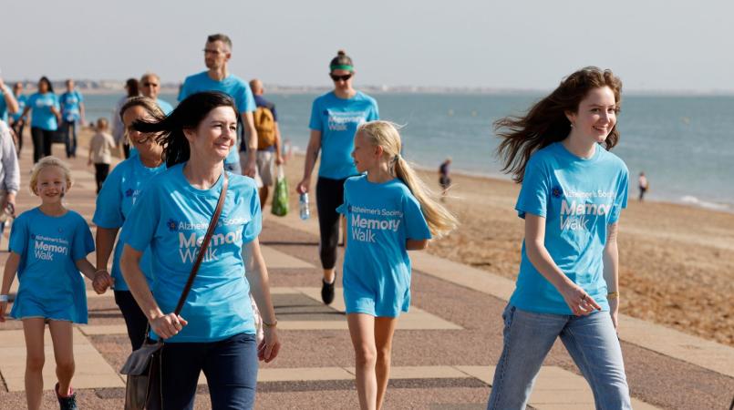 Image of supporters taking part in Memory Walk on the beach