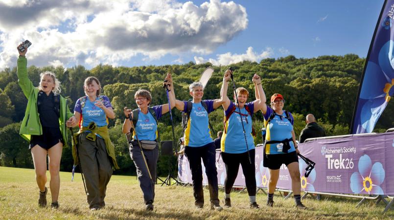 Group of people at Trek26 jumping in the air celebrating