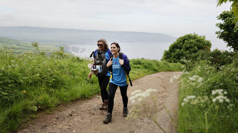 Two trekkers walking Trek26 North York Moors