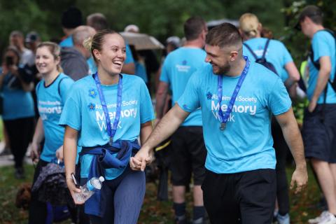 Two walkers smiling