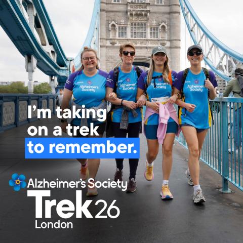 A group of trekkers going over Tower Bridge in London with the text 'I'm taking on a trek to remember'