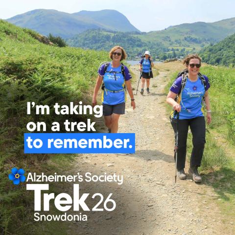 A group of trekkers trekking on a mountain path with the text 'I'm taking on a trek to remember'