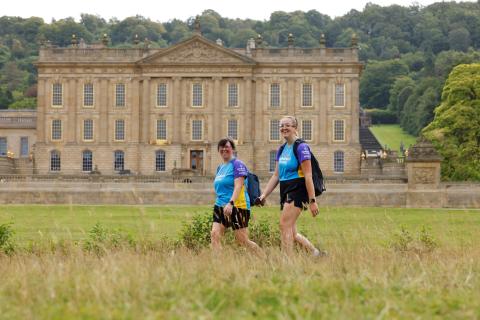 Two trekkers walking Trek26 Peak District